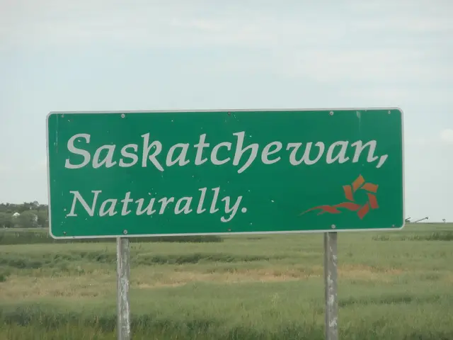 Saskatchewan, Naturally welcome sign in farmland